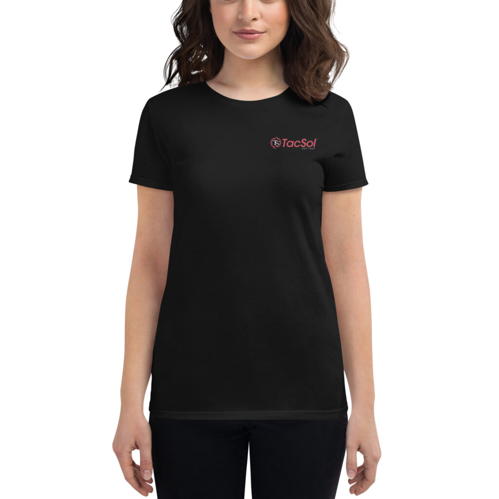 Women wearing a black t shirt with the full red TacSol logo