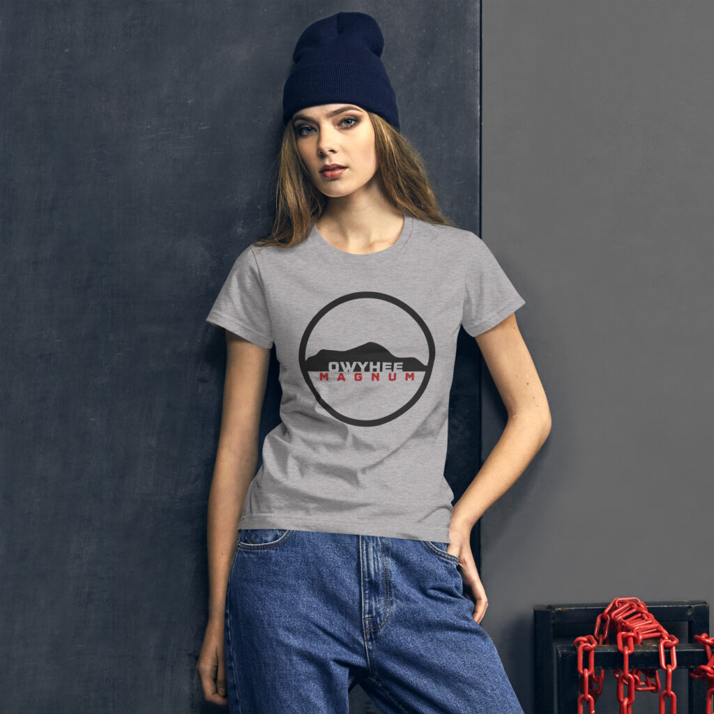 Women wearing a grey t shit with the Owyhee Magnum logo