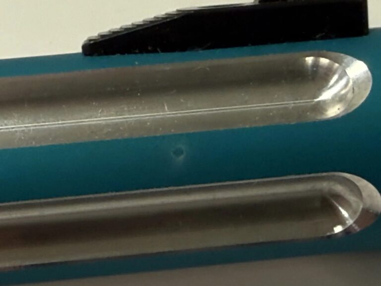 A small blemish on the end of a barrel.